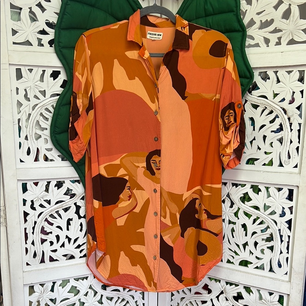 Paradise now button down shirt dress, size XS. Orange colors/ local ladies print